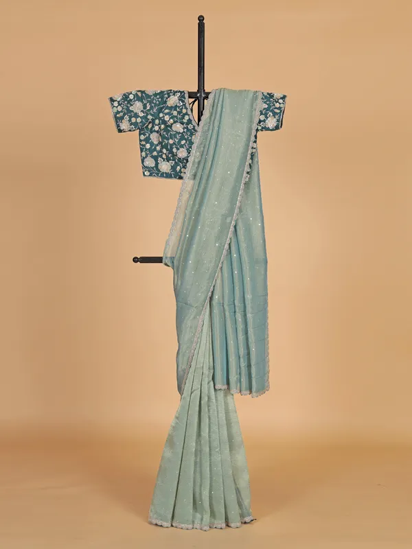 Pastel green organza wedding wear saree