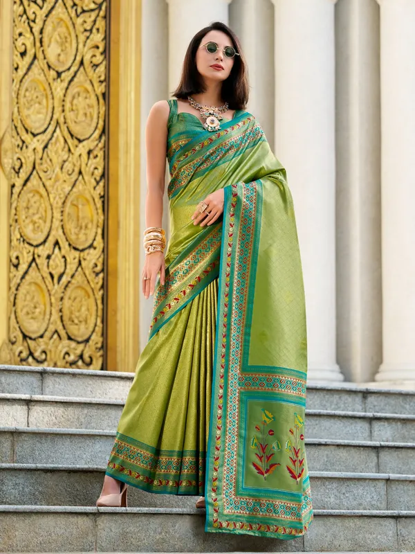Pastel green tissue silk zari weaving saree