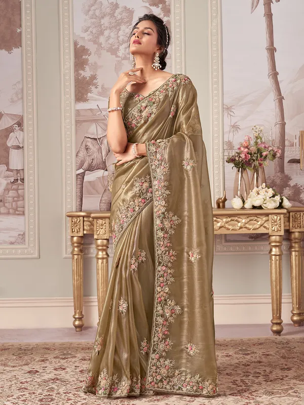 Pastel olive saree with zardosi detailing