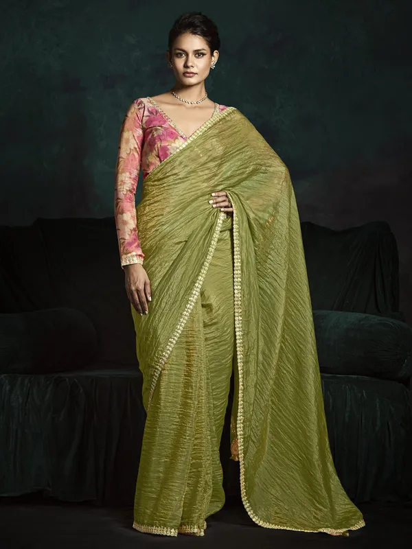 Pastel olive tissue silk saree for wedding