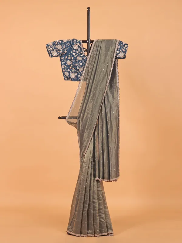 Pastel olive wedding saree in organza