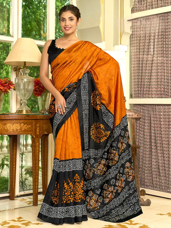 Pastel orange bhagalpuri silk saree with prints