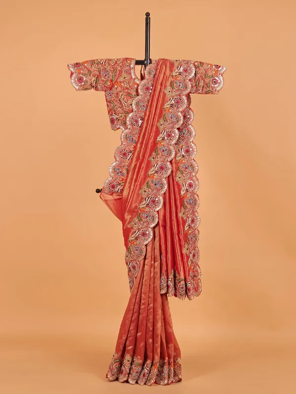 Pastel orange shimmer tissue silk wedding wear saree