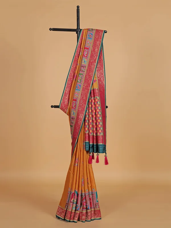 Pastel orange silk festive wear saree