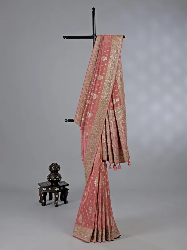 Pastel peach dola silk unstitched saree with festive detailing