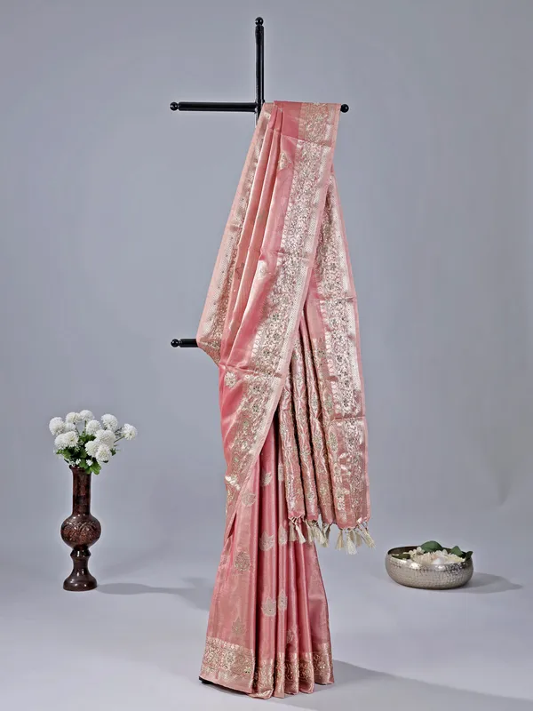 Pastel peach saree with cutdana and sequin detailing