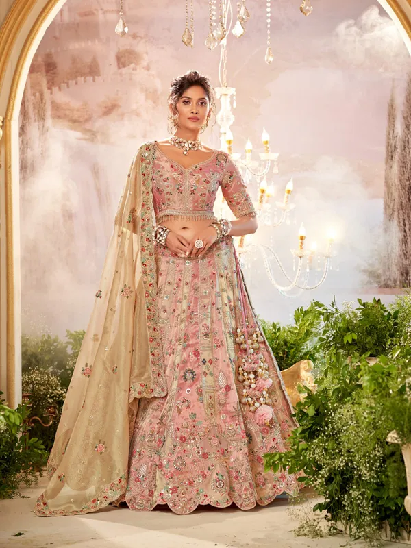 Pastel pink and golden unstitched lehenga choli for weddings