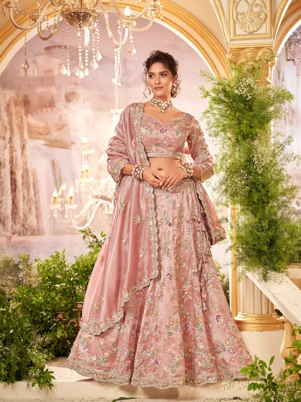 Pastel pink unstitched lehenga choli for bride