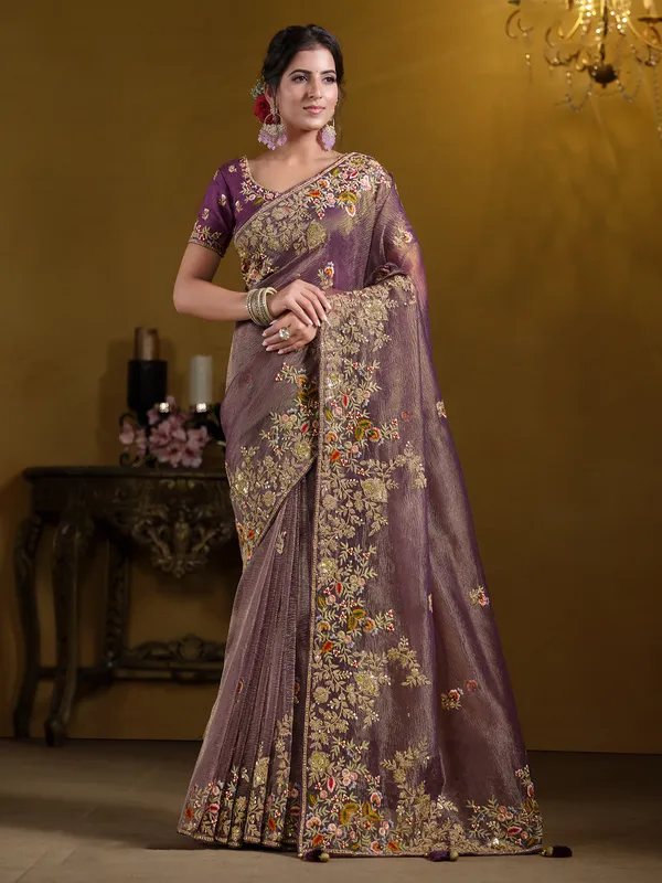 Pastel purple banarasi saree with elegant embellishments