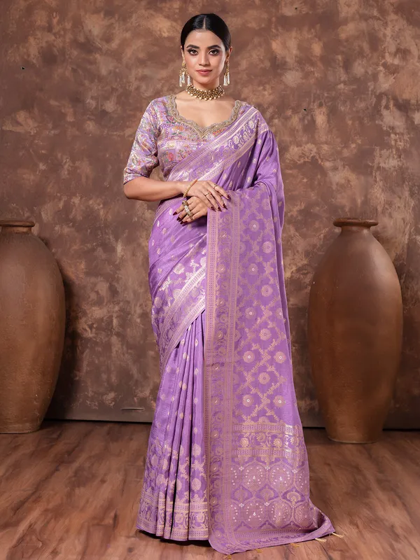 Pastel purple dola silk saree in zari weaving