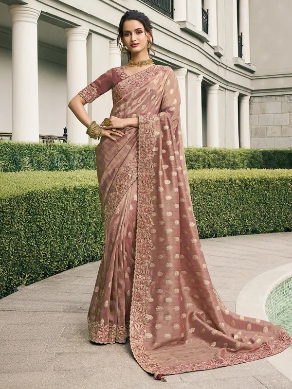 Pastel purple tissue silk saree for grand celebrations