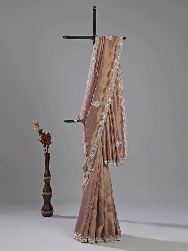 Pastel purple tissue silk saree with designer shine