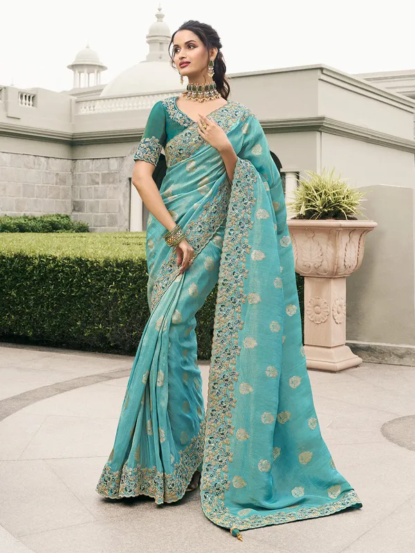 Pastel sky blue tissue silk saree with subtle detailing