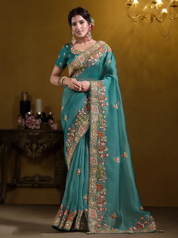 Pastel teal tissue silk saree with zardosi