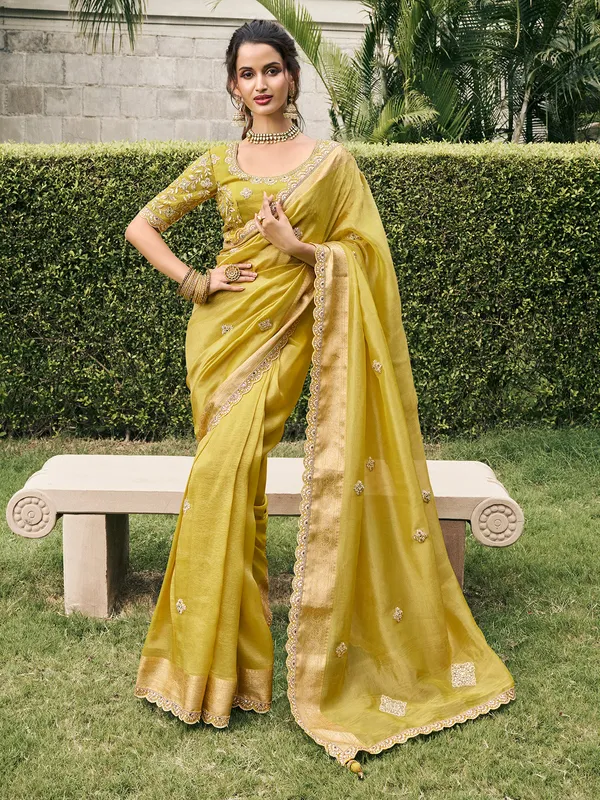 Pastel yellow tissue silk saree for bridal radiance