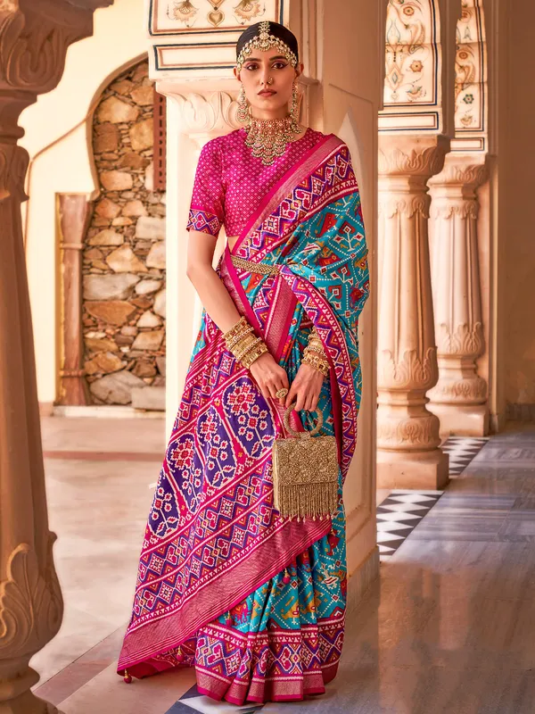 Patola printed aqua silk saree