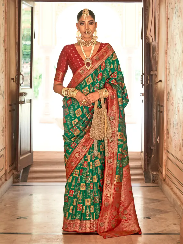 Patola silk saree in dark green