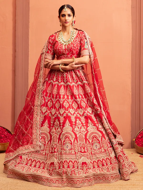 Peach bridal lehenga choli with elbow sleeves