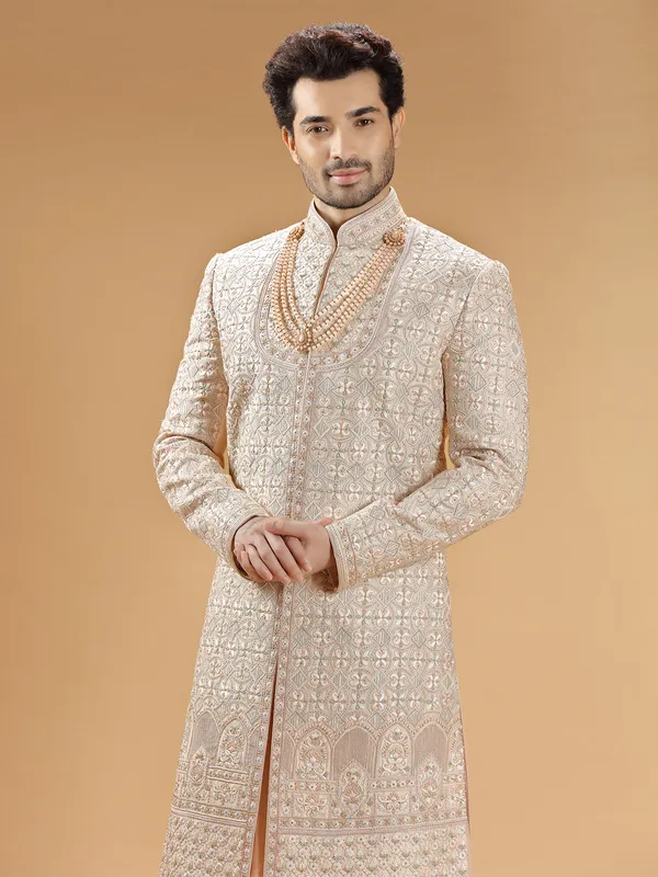 Peach lavish groom sherwani in raw silk