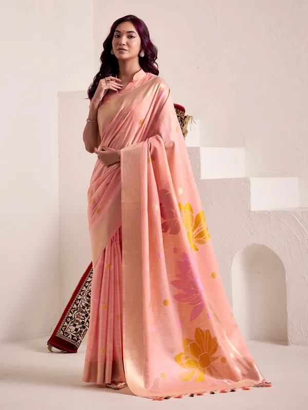 Peach linen saree with zaro worked border