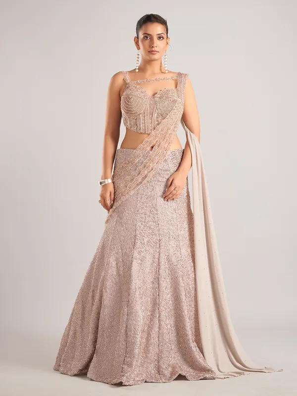 Peach net designer lehenga choli with dupatta