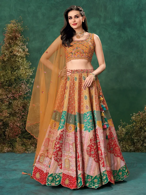 Peach raw silk lehenga choli with print for wedding