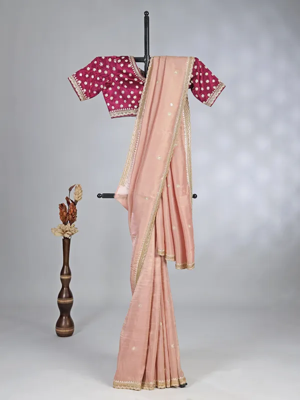 Peach silk saree with cutdana and sequins work