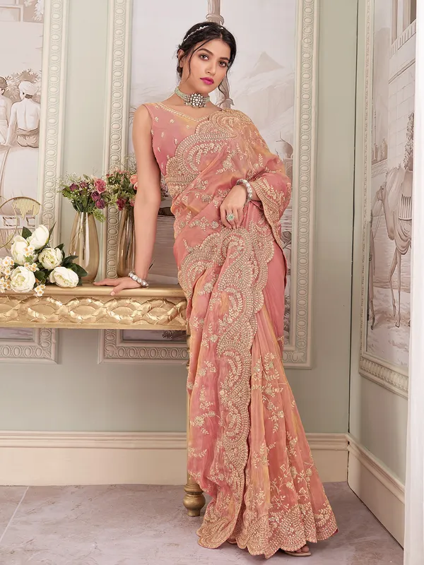 Peach tissue silk saree with embellishments