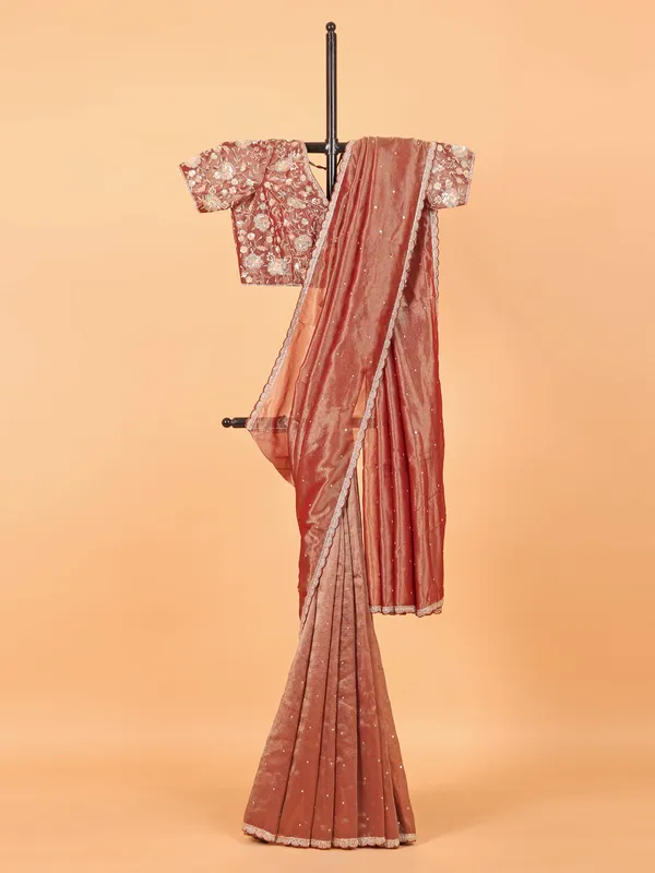 Peach tissue silk saree with ready made blouse