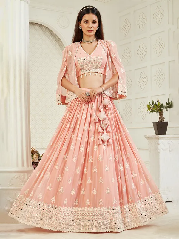 Peach wedding wear georgette lehenga choli with jacket