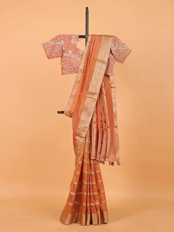 Peach zari worked wedding saree in soft organza