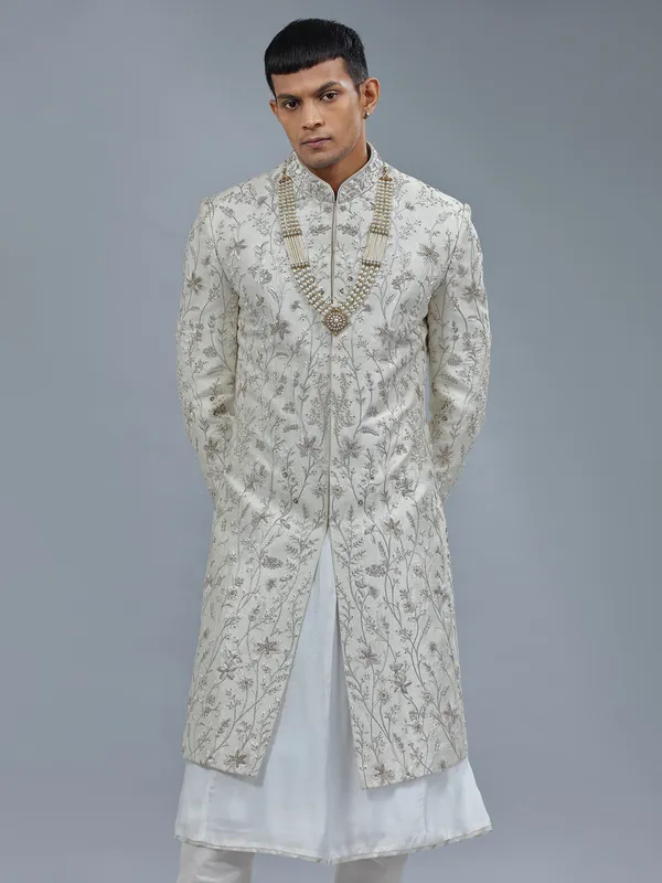 Peshwai style off white raw silk shewani for groom