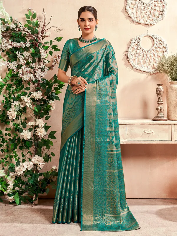 Pine green banarasi silk saree for wedding