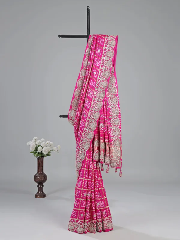 Pink bandhani saree with zardosi detailing