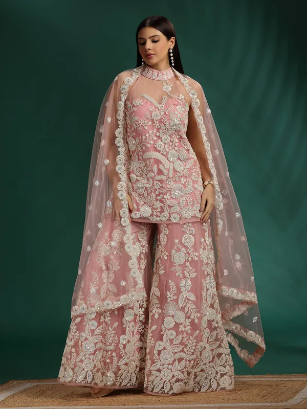 Pink net palazzo suit with heavy embroidery