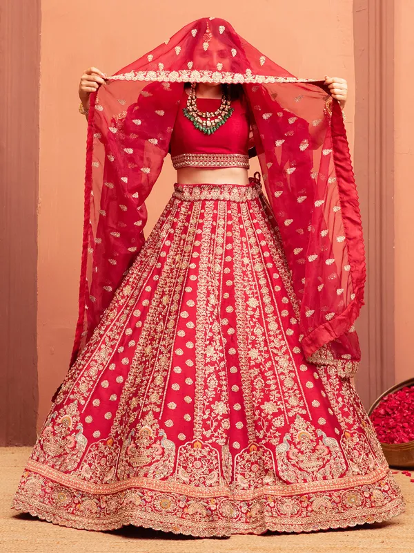 Pink raw silk bridal lehenga choli with boat neckline