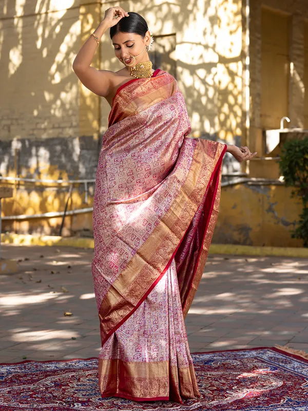Pink silk saree with golden zari weaving