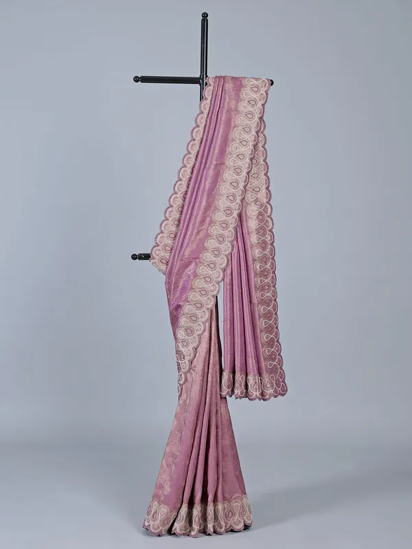 Pink tissue silk saree with unstitched blouse