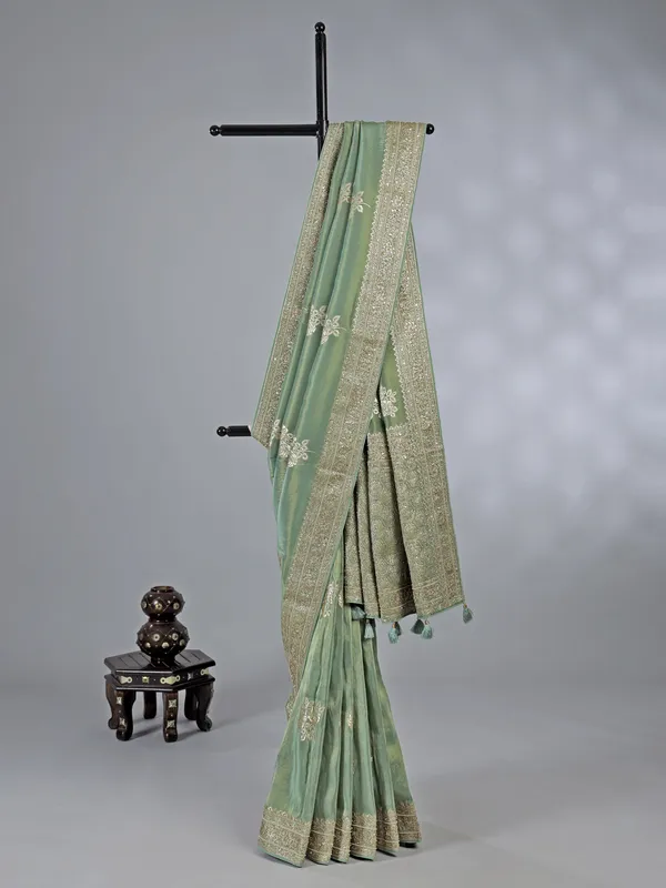 Pista green dola silk saree with zardosi detailing