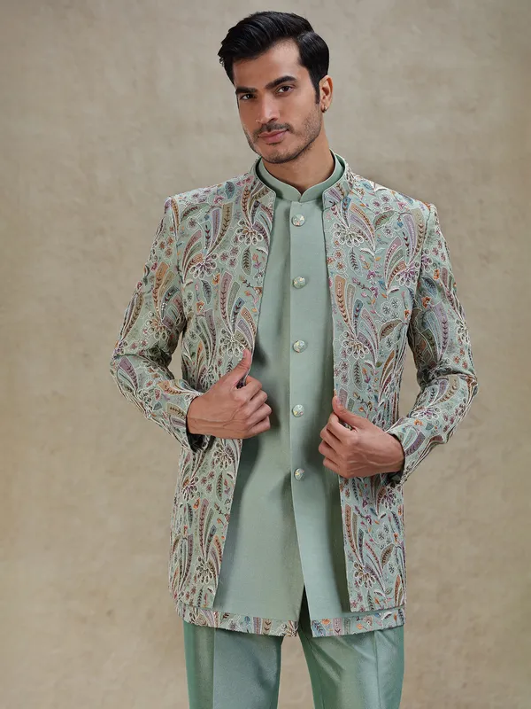 Pista green layered indo-western in stylish embellishment