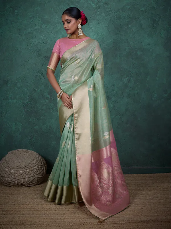 Pista green linen blend saree with zari weaving