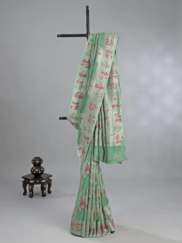 Pista green modal silk saree with colorfull motifs