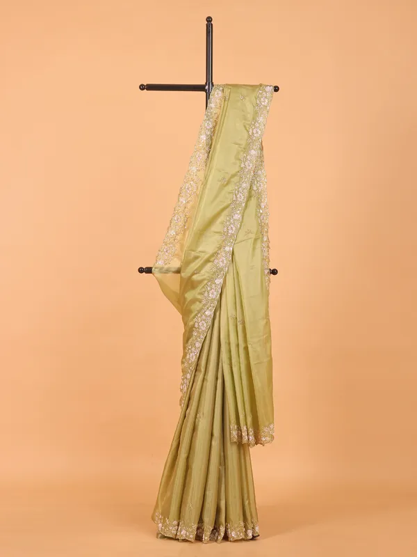 Pista green organza saree with unstitched blouse