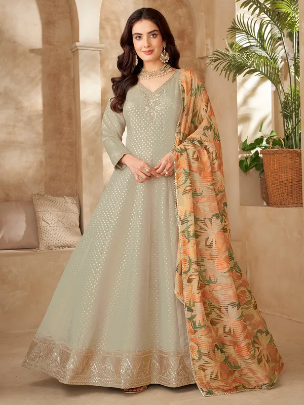 pista green silk anarkali suit with printed dupatta