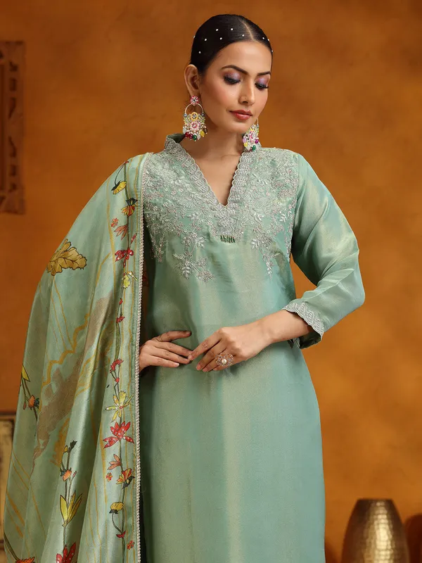 Pista green silk salwar suit with printed dupatta