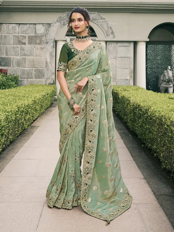 Pista green tissue silk saree for special gatherings