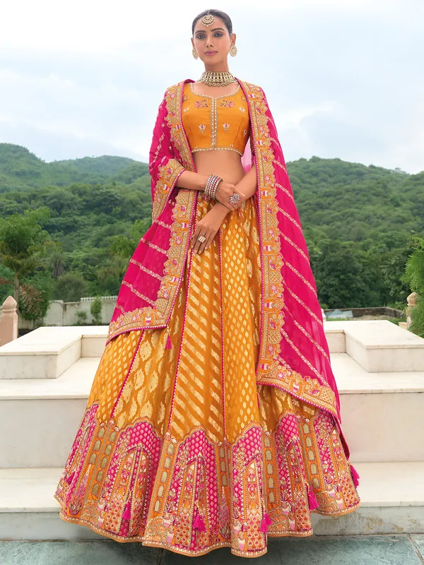 Pretty orange wedding style lehenga choli
