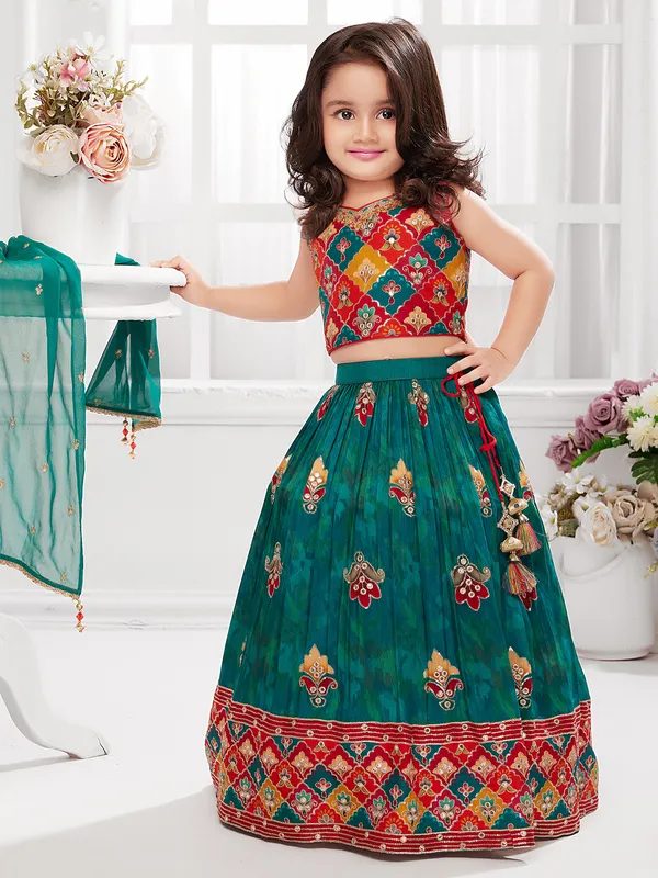 Printed rama green and red silk lehenga choli