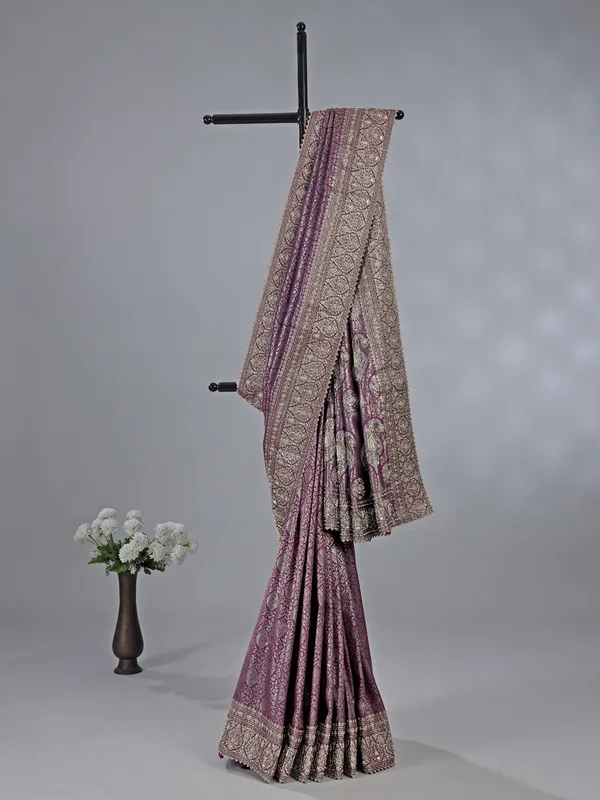 Purple kanjivaram silk saree with royal embellishments