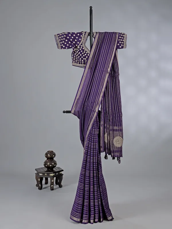 Purple organza saree with traditional sparkle